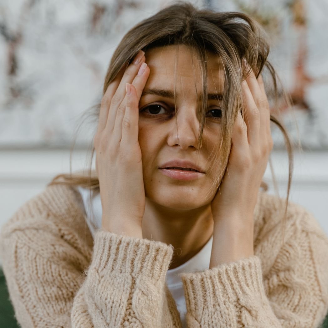 The women in this image try to Identity and Belief Patterns her trauma and disease