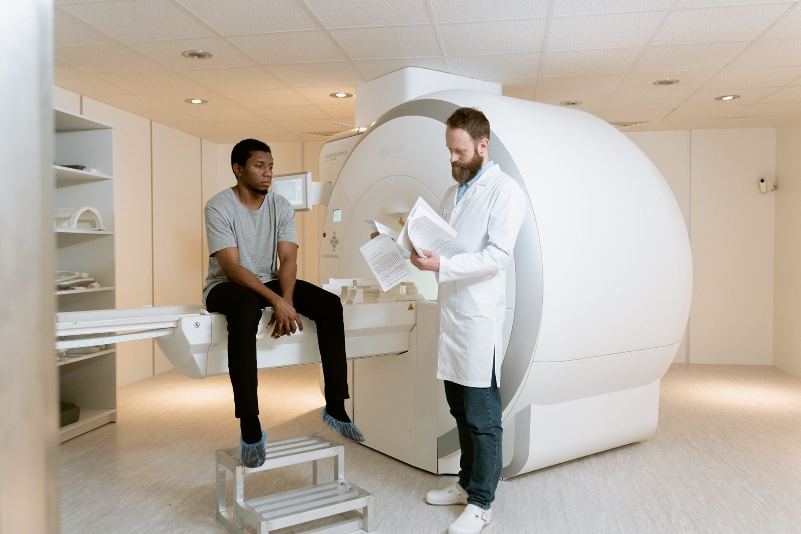 Healthcare professionals reviewing diagnostic imaging results with patient
