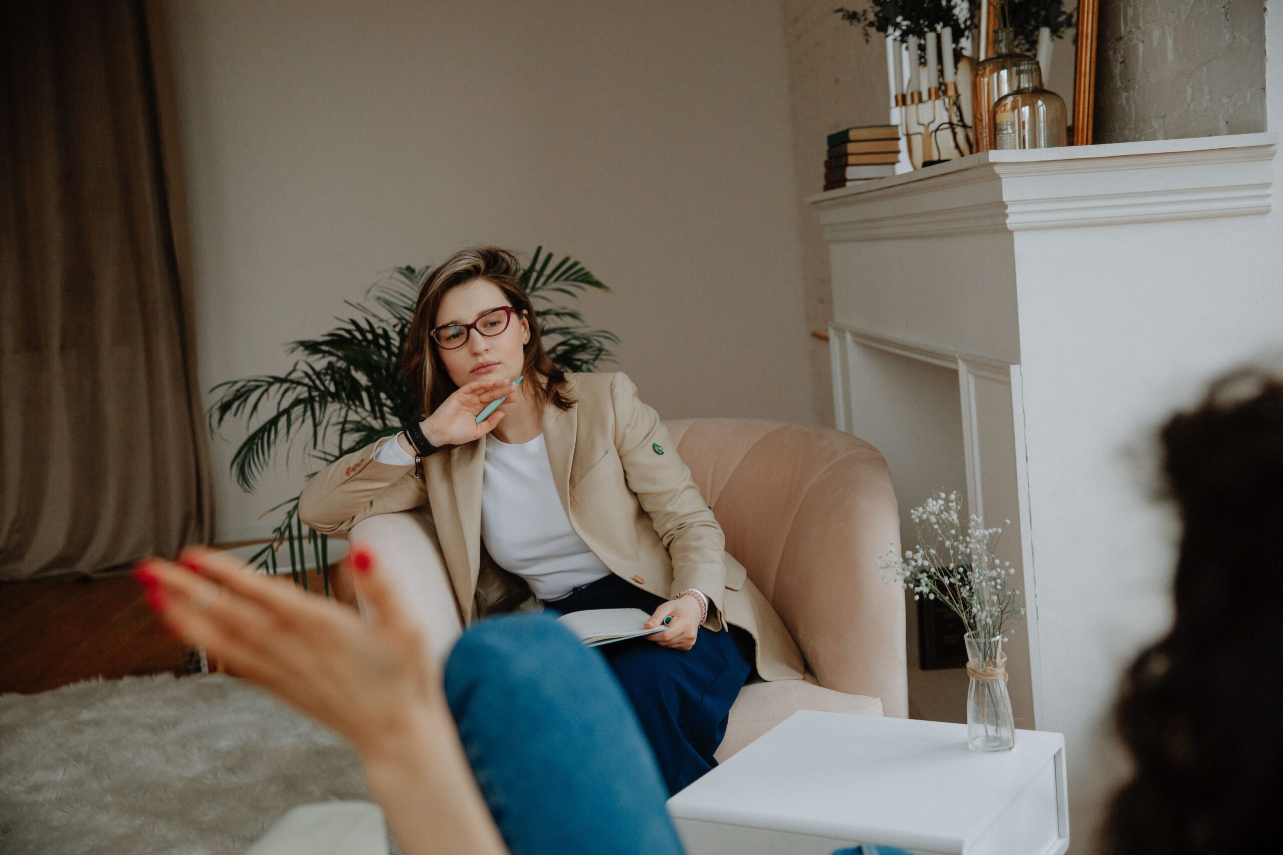 Wellness coach discussing healthy lifestyle changes with client during consultation