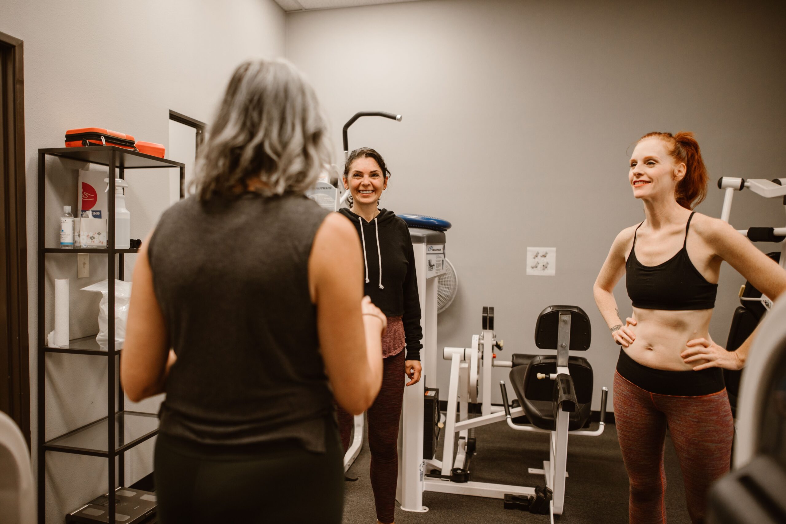 Functional wellness coach working with client on fitness and health improvement goals