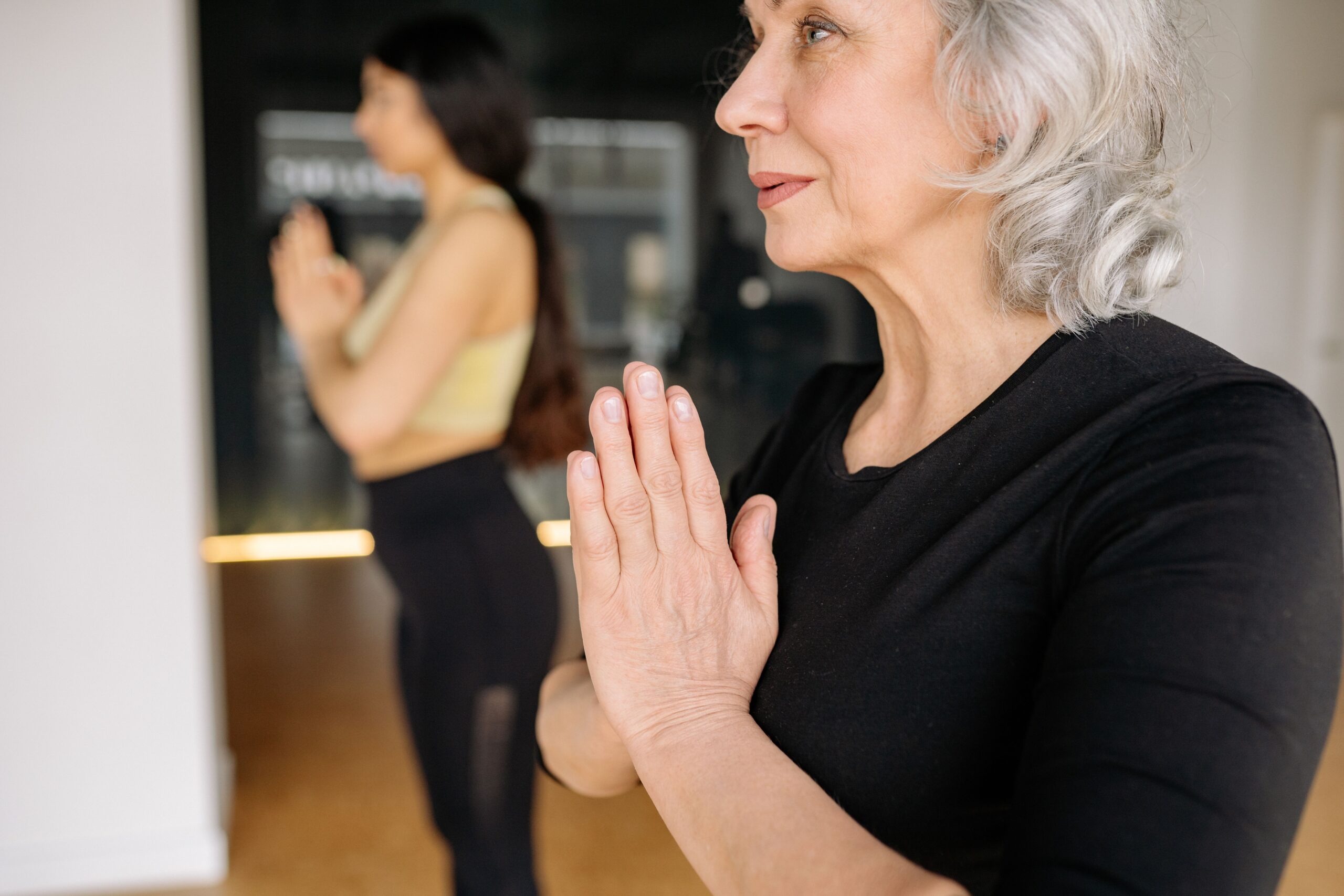 Wellness practitioner guiding client through holistic health and lifestyle coaching