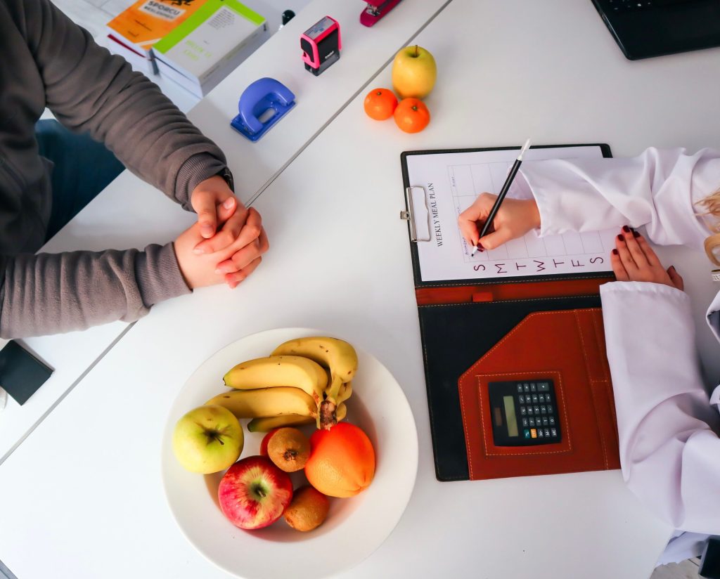 Healthy food planning and nutrition assessment for functional wellness coaching