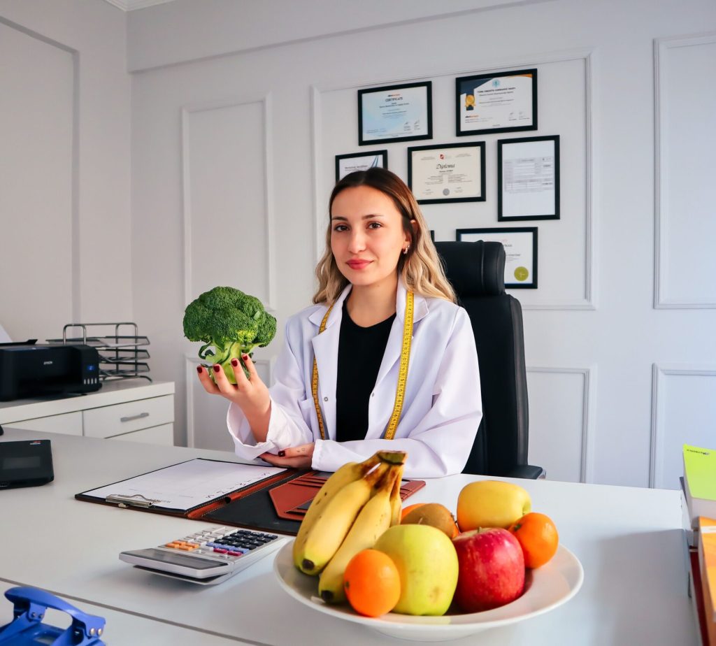 Functional wellness practitioner providing holistic health guidance with healthy foods