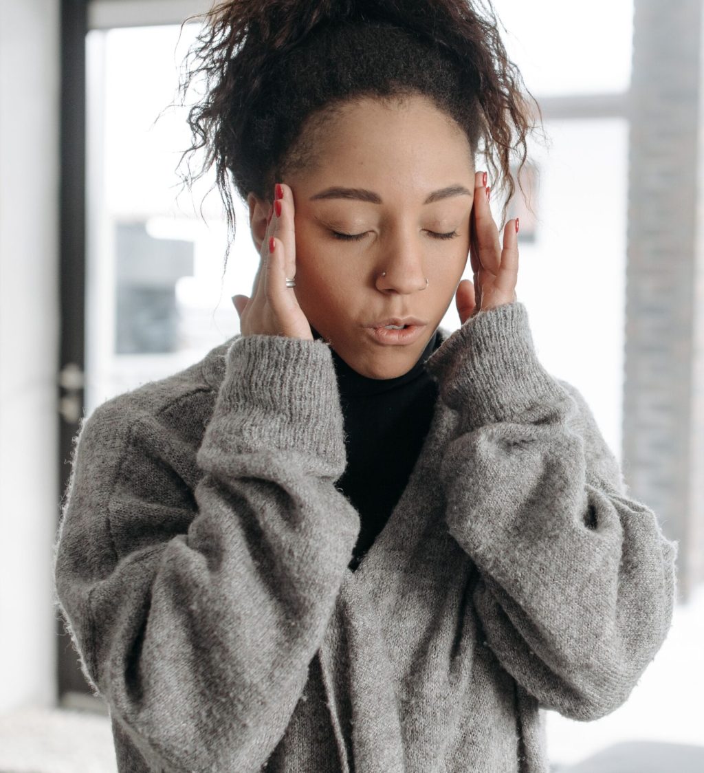 Woman experiencing stress and anxiety symptoms affecting mental wellbeing